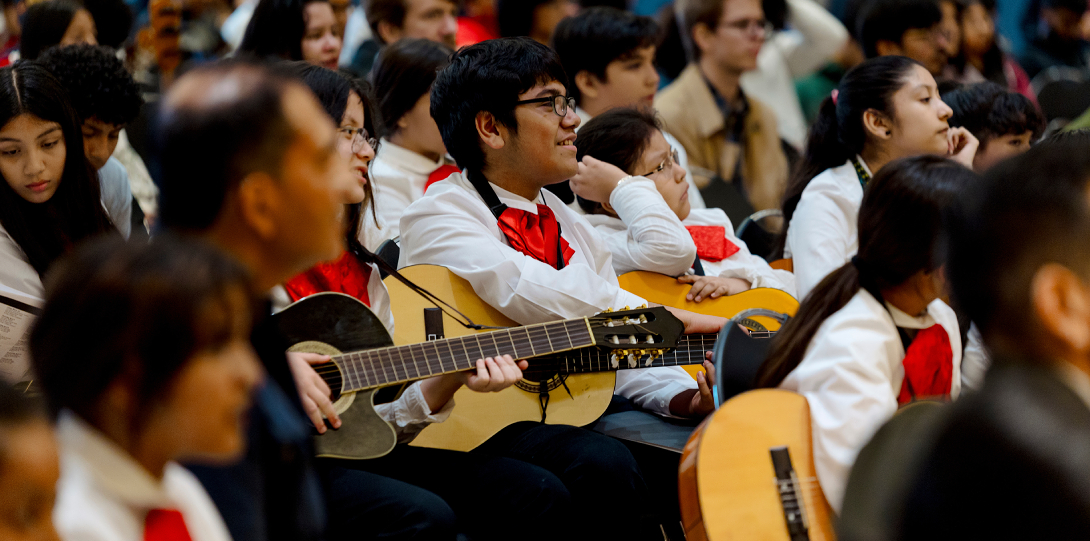 Student performers playing guitar