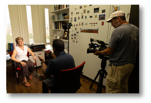 Faculty member being interviewed by news media